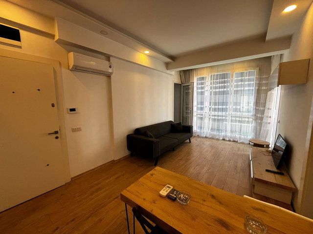REMAX TOROS'TAN MENDERES'TE DENİZE 1 DK MESAFEDE FULL EŞYALI TAŞINMAYA HAZIR 1+1