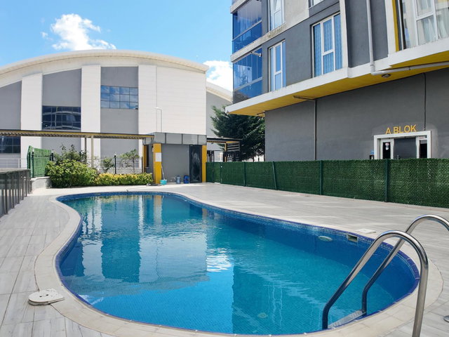 REMAX LAND'DEN SITE IÇINDE DOĞU-GÜNEY CEPHELİ, BOŞ VE KREDİYE UYGUN 2+1 DAİRE