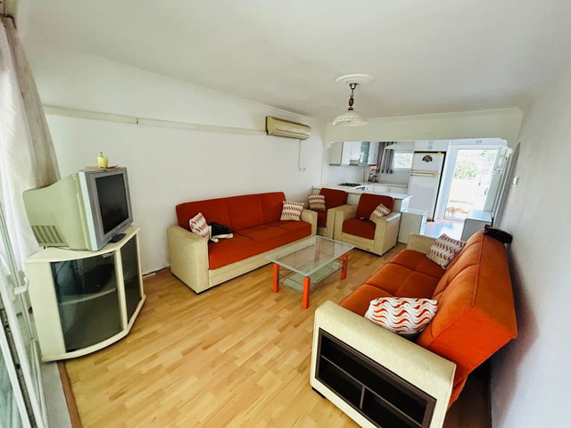 KUŞADASI DAVUTLAR ÖZLEM SİTESİ'NDE 2+1 BAHÇE KATI EŞYALI TEMİZ DAİRE