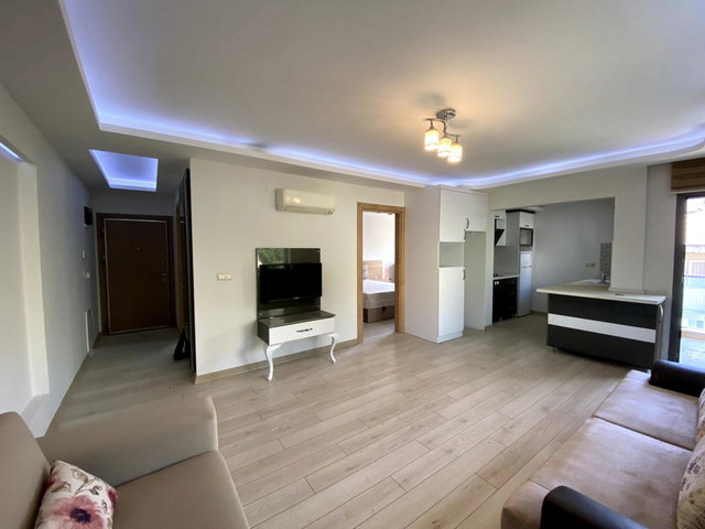 DENİZMEN'DE GENÇ BİNADA ARA KAT EŞYALI ASANSÖRLÜ DAİRE