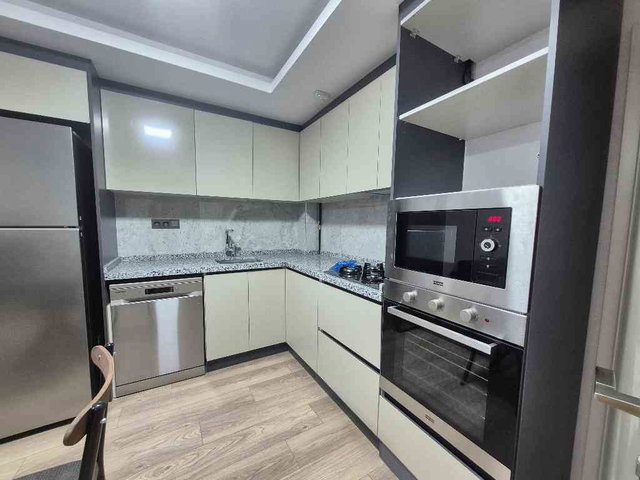 SOKULLU SATILIK EŞYALI İSKANLI SIFIR  1+1 DAİRE