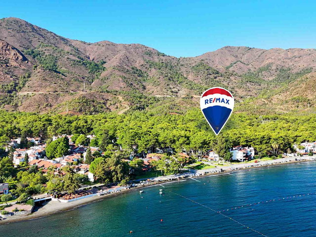 DATÇA AKTUR'DA DENİZE ÇOK YAKIN SATILIK BAHÇE KATI PAPATYA