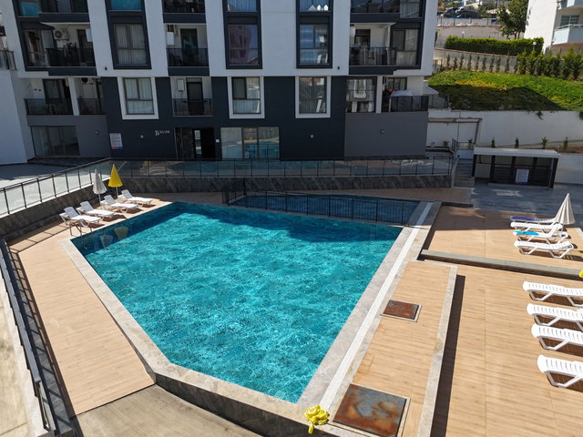 KUŞADASI BEMKA PARADİSE’DA SATILIK 1+1 DAİRE