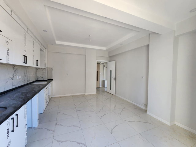 KORKUTELİ / KARŞIYAKA MAH.DE / SIFIR GENİŞ 2+1