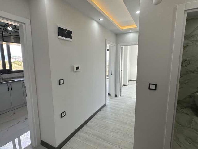 DİDİM MERKEZDE DENİZ MANZARALI SIFIR 2+1 DAİRE
