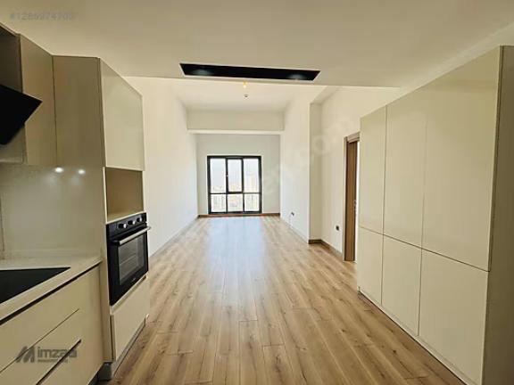 GÜMÜŞ PANORAMA BALKONLU 1+1 BÜYÜK TİP SATILIK DAİRE