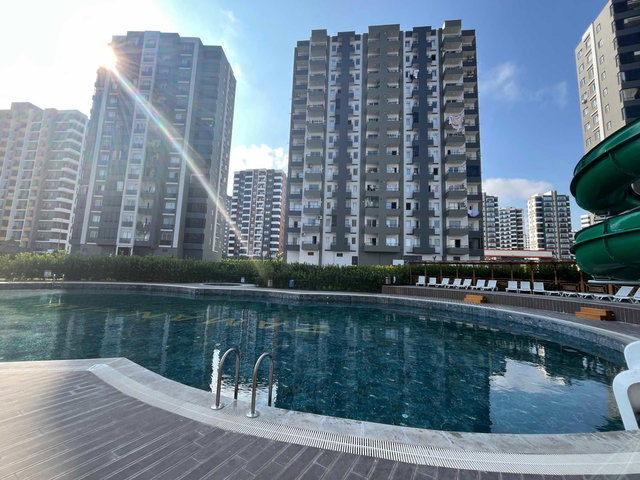 REMAX RİNA'DAN HAVUZLU SİTE İÇERİSİNDE 1+1