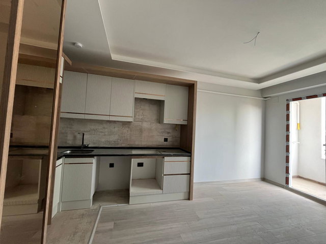 REMAX RİNA'DAN HAVUZLU SİTE İÇERİSİNDE 1+1