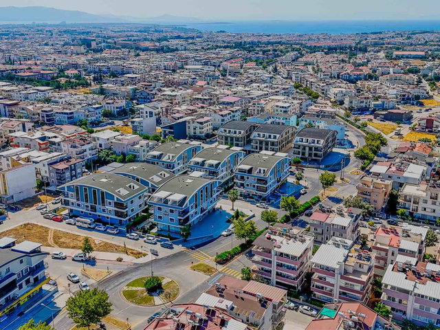 DIDIM EFELER ORACLE MARINA APARTMANLARI SITESINDE SATILIK 1+1 BAHÇE KATI DAIRE