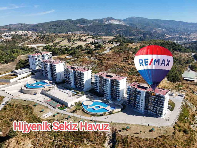 KUŞADASI EŞİN GOLF RESORT’TA  DENİZ & HAVUZ MANZARALI EŞYALI 1+1 | KAÇIRILMAYACAK FIRSAT