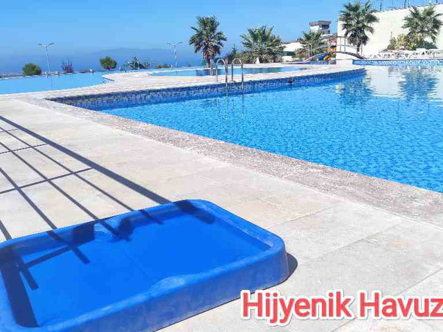 KUŞADASI EŞİN GOLF RESORT’TA  DENİZ & HAVUZ MANZARALI EŞYALI 1+1 | KAÇIRILMAYACAK FIRSAT
