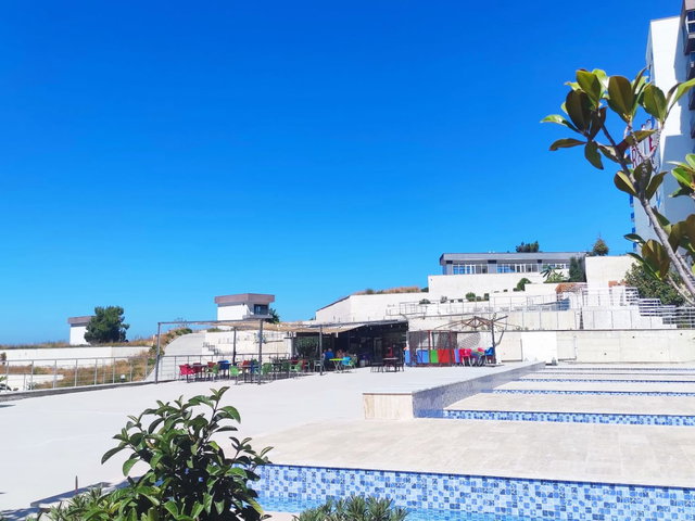 KUŞADASI EŞİN GOLF RESORT’TA  DENİZ & HAVUZ MANZARALI EŞYALI 1+1 | KAÇIRILMAYACAK FIRSAT