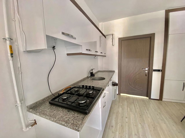 REMAX MODEL BAĞBAŞI ANA YOLA YAKIN 1+1 FULL EŞYALI SATILIK APART