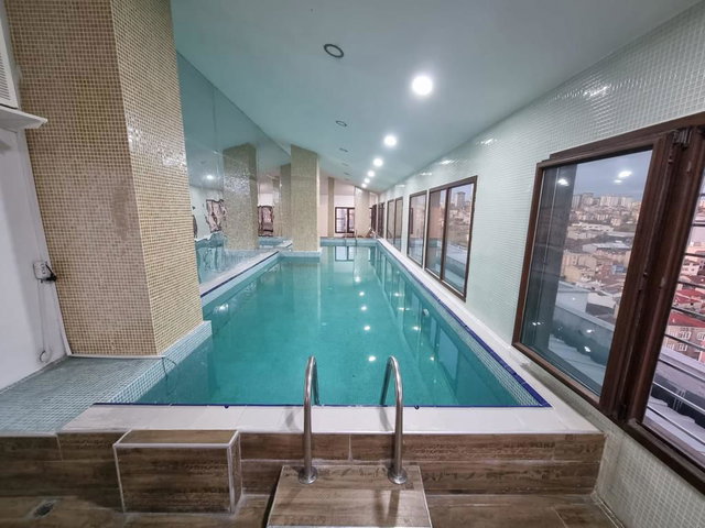 REVOIST GÜNEŞLI EVLERINDE HAVUZLU,SAUNALI,SATILK 3+1 143M2DAIRE