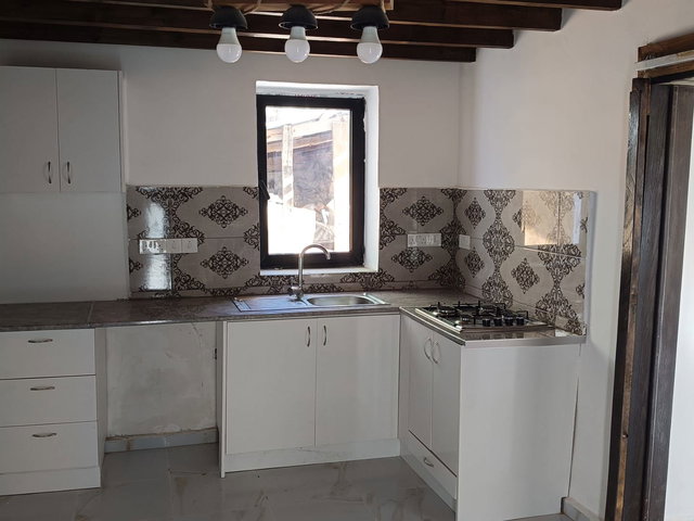 GİRNE TAŞKENT MERKEZ’DE EŞYASIZ1+1 KİRALIK DAİRE | DOĞALGAZ SOBASI