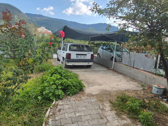 KUŞADASI GÜZELÇAMLIDA 5+1 TAM MÜSTAKİL TRİPLEKS VİLLA