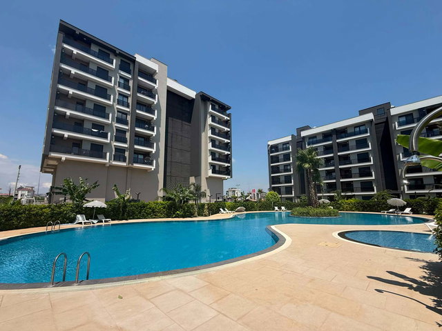 BARAJ MAH. PALMA SİTESİNDE ARAKAT EŞYASIZ KİRALIK 1+1 DAİRE