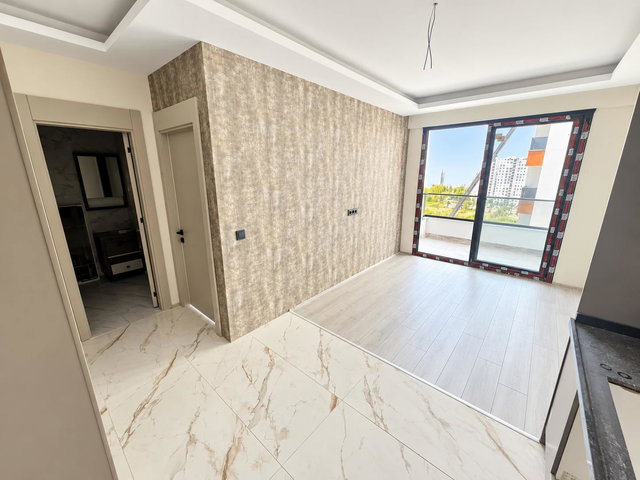 REMAX RİNA'DAN TÖMÜK'TE DENİZE 200M MESAFE ULTRA LÜKS 1+1