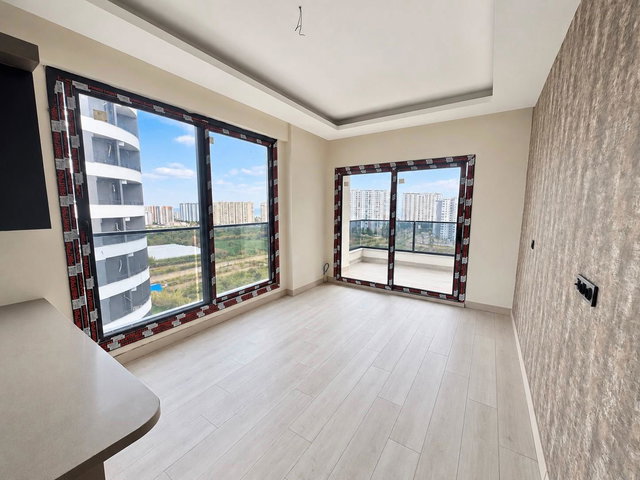 REMAX RİNA'DAN TÖMÜK'TE DENİZE 200M MESAFEDE ULTRA LÜKS 1+1