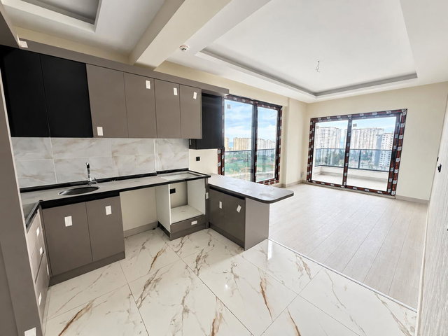 REMAX RİNA'DAN TÖMÜK'TE DENİZE 200M MESAFEDE ULTRA LÜKS 1+1