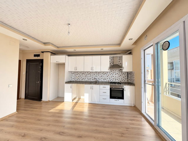 REMAX RİNA'DAN DUMLUPINAR MAH.DE SAHİLE YÜRÜME MESAFESİNDE 1+1