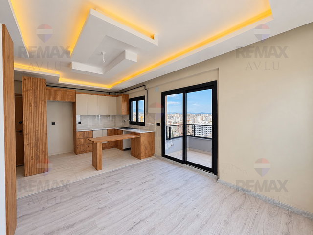 REMAX AVLU'DAN ERDEMLİ'DE EŞYALI/EŞYASIZ SIFIR KİRALIK 1+1 DAİRE