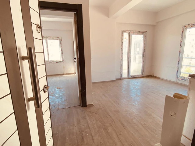 REMAX TOROS'TAN ERDEMLİ MERKEZDE UYGUN FİYATLI SATILIK 1+1