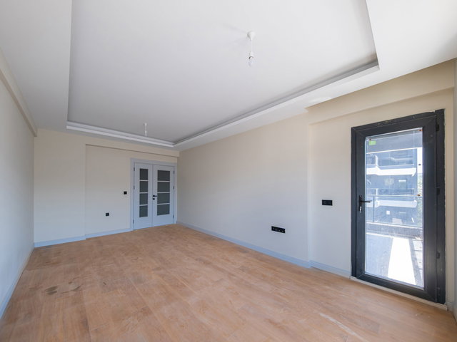 BORNOVA'DA YENI BINADA SITE IÇERISINDE SIFIR KIRALIK 3+1 DAIRE