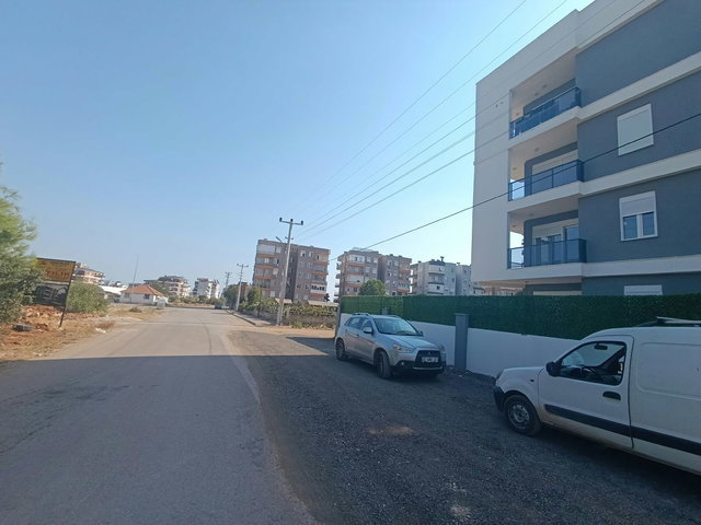 AYDOĞMUŞ'TA GENİŞ FERAH HAVUZLU 2+1 GİRİŞ KAT