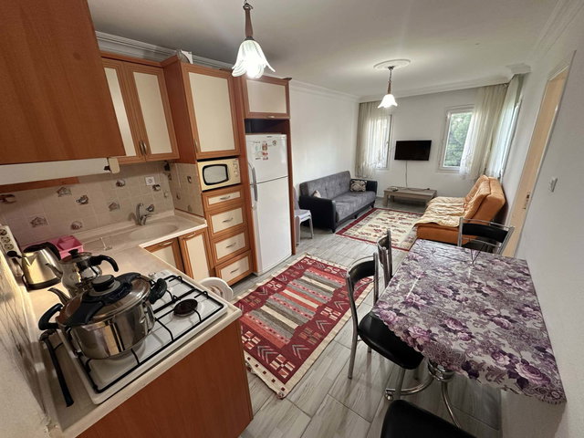 FETHİYE, ÖLÜDENIZ, OVACIK'TA, HAVUZLU SİTE İÇERİSİNDE, EŞYALI SATILIK 2+1 DAİRE