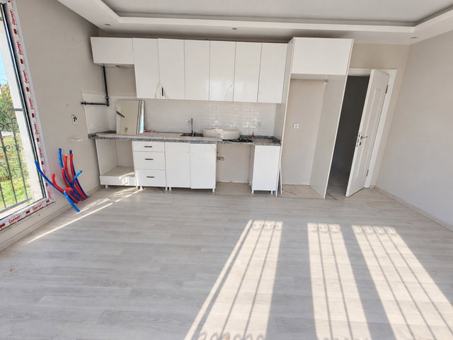 KUMBURGAZ’DA SIFIR 2+1 | GİRİŞ KAT | 2 BANYO | ÇİFT CEPHE