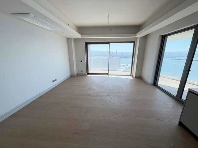 NEVA YALI KESİNTİSİZ DENİZ MANZARALI 2+1 SATILIK DAİRE