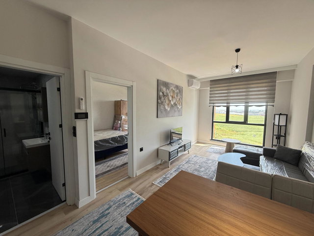 REMAX LAND' DEN UYSAL GLORIA'DA EŞYALI KLİMALI KİRALIK 1+1 DAİRE