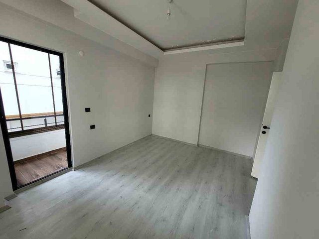 ATAKUM FİNAL OKULLARININ ARKA SOKAĞINDA SATILIK 2+0 CAM BALKONLU  KİRACILI SATILIK DAİRE