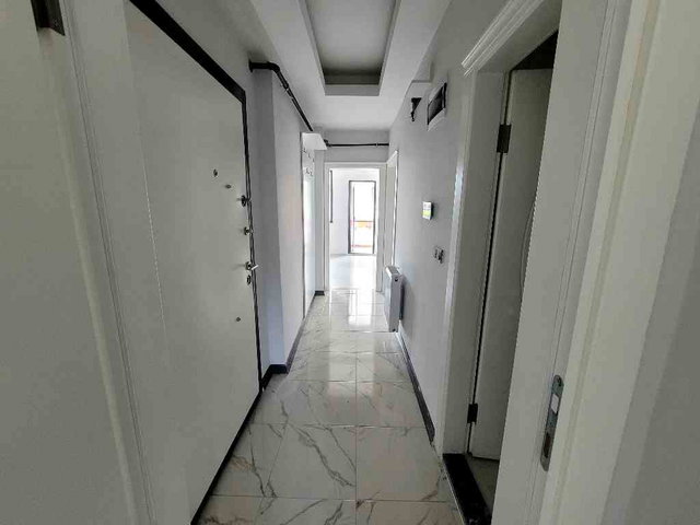 ATAKUM FİNAL OKULLARININ ARKA SOKAĞINDA SATILIK 2+0 CAM BALKONLU  KİRACILI SATILIK DAİRE