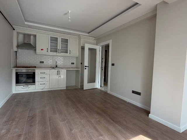 EMİRHAN CADDESİNDE YENİ BİNADA KIİRALIK 1+1 DAİRE