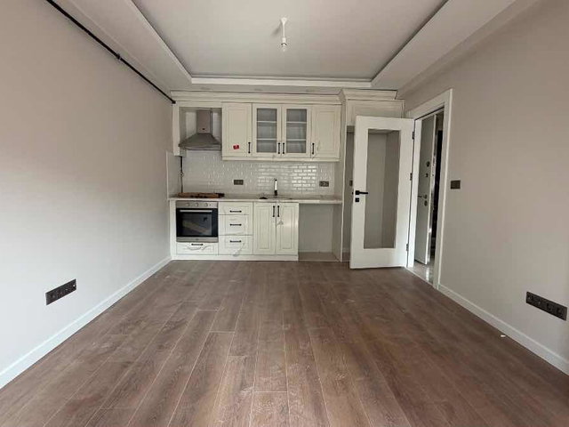 EMİRHAN CADDESİNDE YENİ BİNADA KIİRALIK 1+1 DAİRE