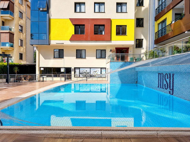 PENDİK METROSUNA 5 DK MESAFEDE SİTE IÇINDE KISMİ DENİZ MANZARALI KAPALI  OTOPARKLI 2+1
