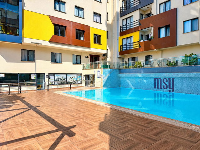 PENDİK METROSUNA 5 DK MESAFEDE SİTE IÇINDE KISMİ DENİZ MANZARALI KAPALI  OTOPARKLI 2+1