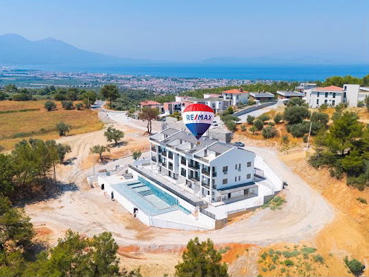 SOĞUCAK’TA MODERN MIMARI, YERDEN ISITMALI VE ORTAK HAVUZLU KIRALIK 2+1 DAIRE