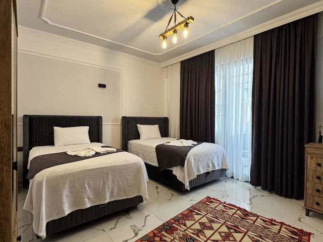 MUĞLA SEYDİKEMER’DE SATILIK, TURİZM BELGELİ LÜKS DUBLEKS VİLLA