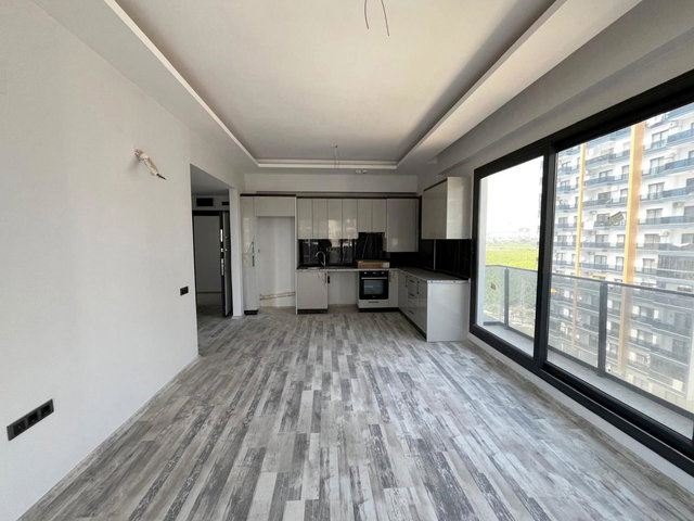 REMAX TOROS'TAN KARGIPINARI'NDA HAVUZLU SİTE İÇERİSİNDE CAZİP FİYATLI GENİŞ 1+1