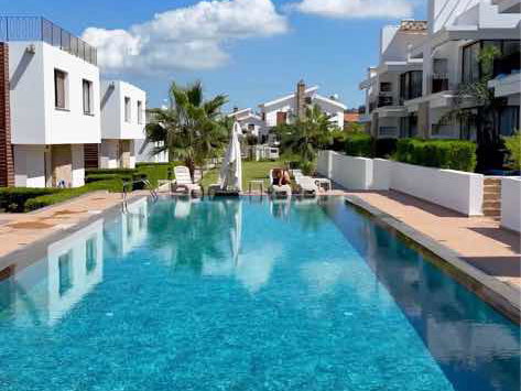 BEAUTİFUL 2-BEDROOM RESİDENCE WİTH A PRİVATE GARDEN AND POOL VİEW

 NESTLED İN A STUNNİNG COAS
