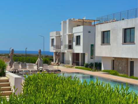 BEAUTİFUL 2-BEDROOM RESİDENCE WİTH A PRİVATE GARDEN AND POOL VİEW

 NESTLED İN A STUNNİNG COAS
