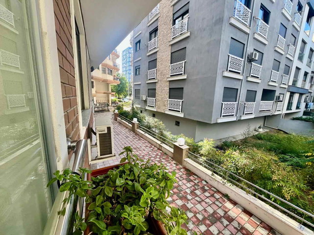 KARŞIYAKA BOSTANLI’DA ÇİFT CEPHELİ YENİ BİNA SATILIK 2+1 DAİRE