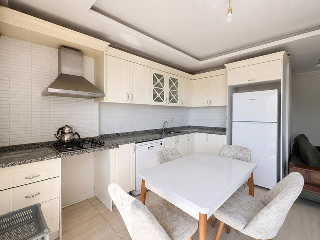 REMAX RİNA’DAN YENİŞEHİR’DE HAVUZLU SİTEDE  FULL EŞYALI 2+1