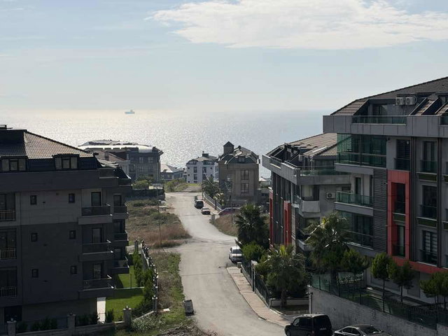 MÜKEMMEL SİTE IÇINDE EŞYALI 2+1 EBVIENLI DENİZ MANAZARALİ KREDİYE UYGUN KAPALI VE AÇIK HAVUZLU فروش