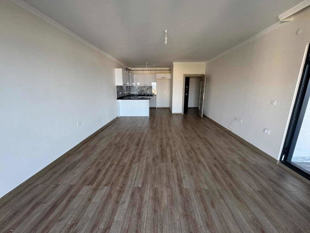 BEŞIRLI 'DE DENIZ MANZARALI GENIŞ BALKON SITE İÇI KIRALIK DAIRE