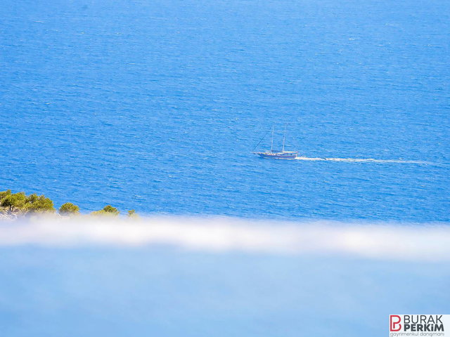 KAŞ BEZİRGAN’DA DENİZ MANZARALI SATILIK 2 VİLLA VE 4.911 M² HİSSE