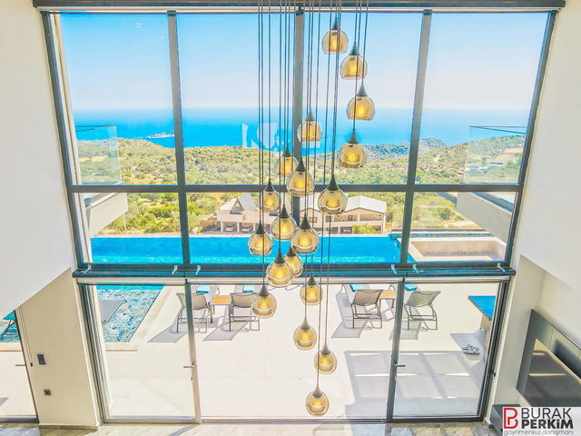 KAŞ BEZİRGAN’DA DENİZ MANZARALI SATILIK 2 VİLLA VE 4.911 M² HİSSE